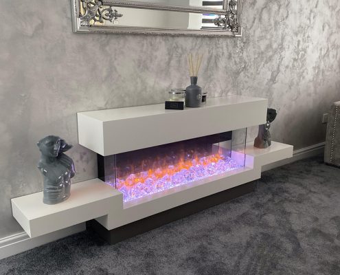 Focus Cherbourg suite in a White finish. Complemented with the Gazco E Reflex electric fire.