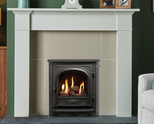 Gazco Logic HE CF Slide Control fire with Log-effect fuel bed, shown with Stockton front and Grey Brompton Mantel