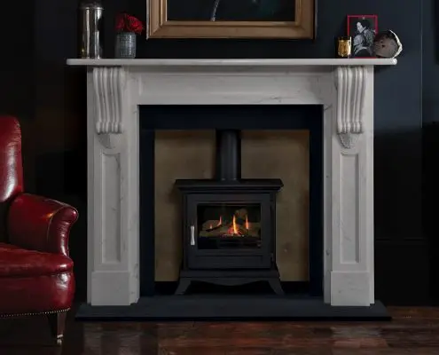 Chesneys’ Buckingham fireplace in finest statuary marble statuary marble shown with Chesneys’ Beaumont gas stove