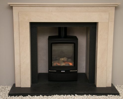 Natura Fireplaces Wentworth in Marsden Beige Limestone with matching chamber and Antique Nero Granite slips, hearth and back hearth