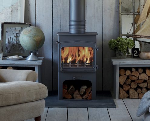 Wildwood 5kW woodburning stove with integral log store style base