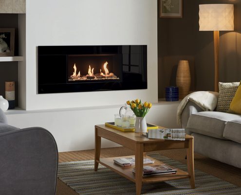 Gazco Studio 1 Glass gas fire Conventional Flue, with Pebble and White Stone fuel bed and Black Reeded lining
