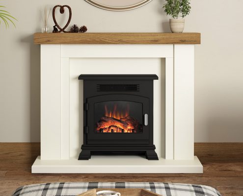 Elgin & Hall - 46” Bracken elec- tric fireplace in Soft White paint- ed finish featuring a Country Oak top complete with Banbury electric stove